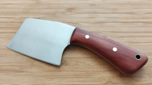 Left view of 6 7/8" Mini Cleaver EDC, high carbon steel with a brushed blade and red cedar handle