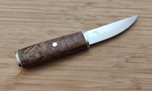Right side view of Southern Red Oak Puukko #323 custom knife with 1070 steel blade and peened through-tang handle