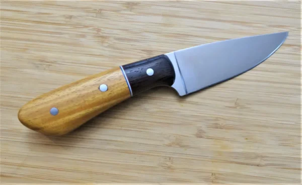Right side of GreBec Goldilocks #207 knife with brushed drop point blade, Osage Orange handle, and Wenge bolster.