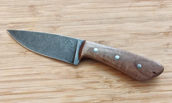 Red Maple Goldilocks #271 drop point EDC knife, full left view, stonewashed 1095 steel blade, red maple handle with mild steel pins