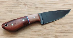 Wild Plum Goldilocks #305 custom drop point knife with stabilized Florida Wild Plum and Sand Pear handle, coffee-etched 1095 steel blade, right side view