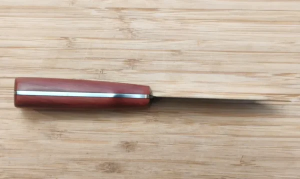 Bellly view of the Red Cedar Paring Knife, showing high carbon steel full tank and blade edge