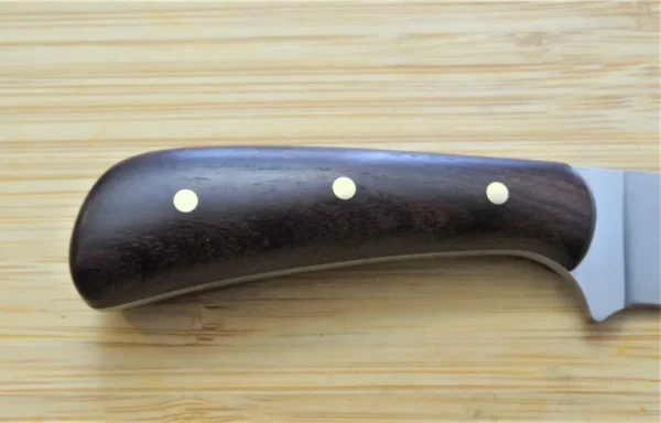 Right Handle view with a Kingwood handle and brass pins