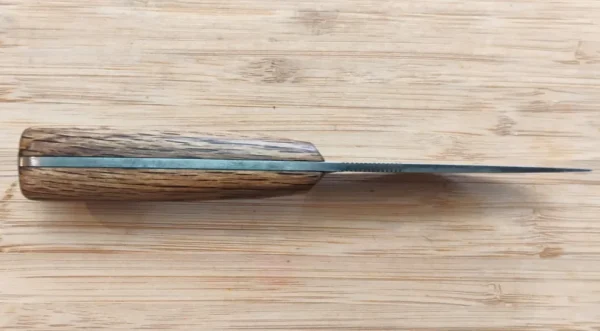 Spine closeup of GreBec Caping Knife, 1095 High Carbon Steel