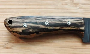 Right side of a Florida Series knife handle made with Spalted Pecan showing heavy spalting with 3 Mosaic Pins and a Lanyard tube.