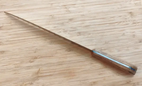 elly view of Pecan Brisket Knife #348 showing curved 9 3/4" blade edge.
