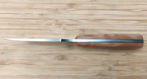 south Florida Black Olive Trailing Point #311 knife showing the straight spine with a distal taper