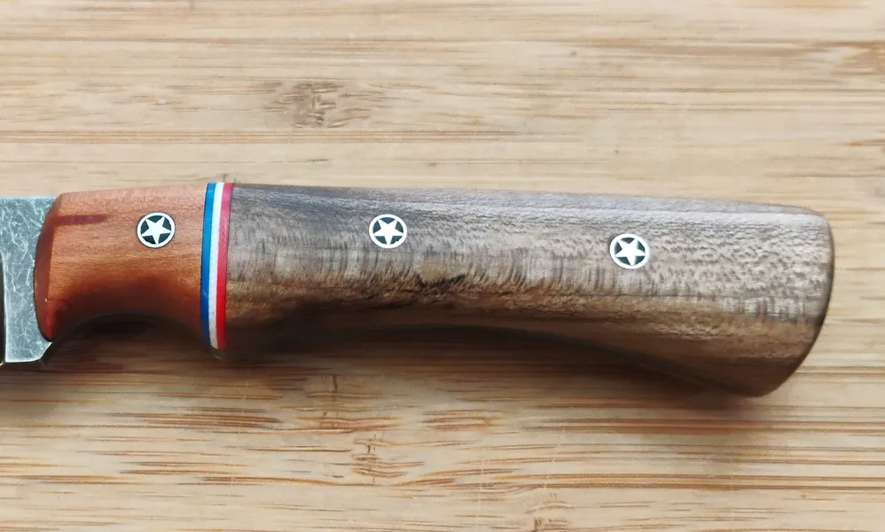 Red Maple custom knife handle with Wild Black Cherry bolster, red, white and blue spacers and mosaic pins