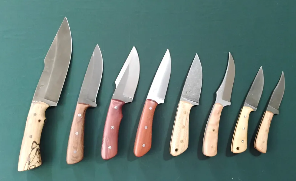 Eight custom Florida Wood knives with stabilized wooden handles, for Ocala Downtown Market 7/19/25