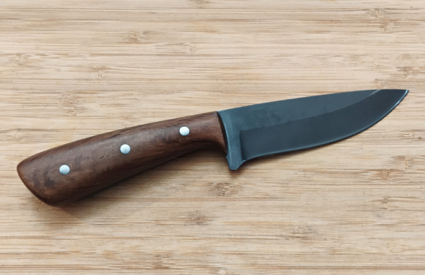 Right side view of the Devon hunting knife showcasing the Live Oak handle and 4 1/4” acid etched drop point blade.